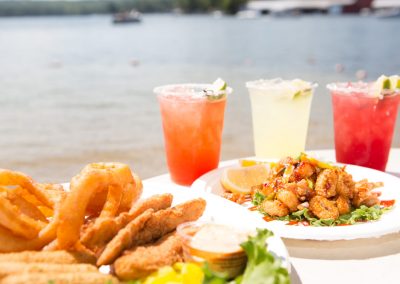 Mixed drinks shrimp and salad, fried calamari.