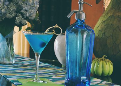 Blue martini and seltzer bottle