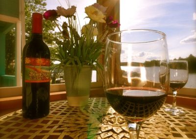 Glass of red wine on patio table