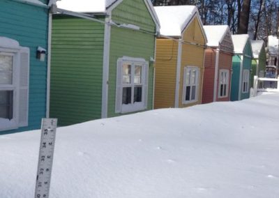 Snow covered cottages.